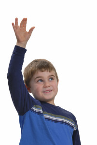 Picture of boy raising his hand